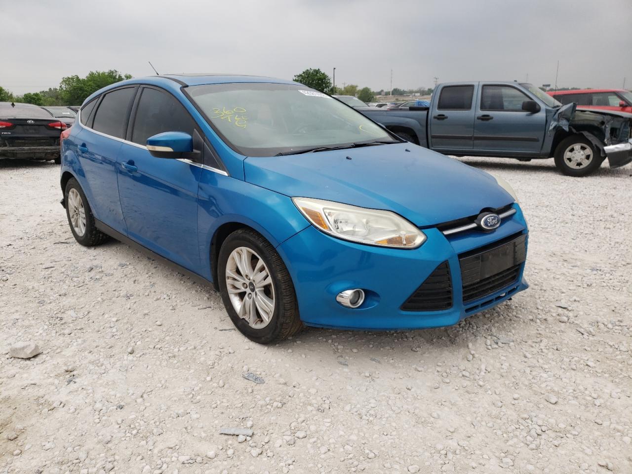 FORD FOCUS SEL 2012 with VIN 1FAHP3M20CL135712 - Photo from auction
