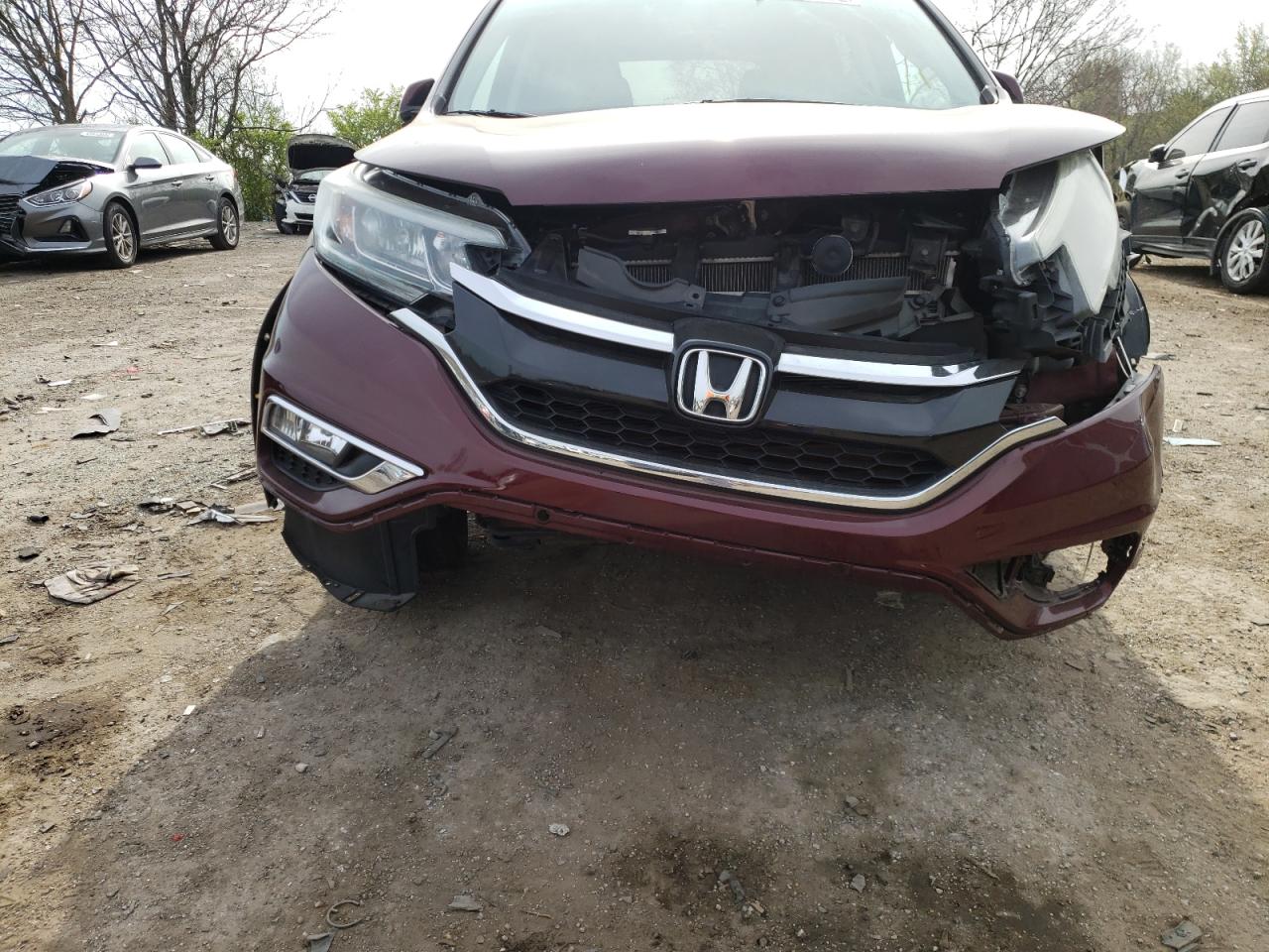 Photo 9 from auction – 2015 HONDA CR-V EXL with VIN 2HKRM4H74FH673258