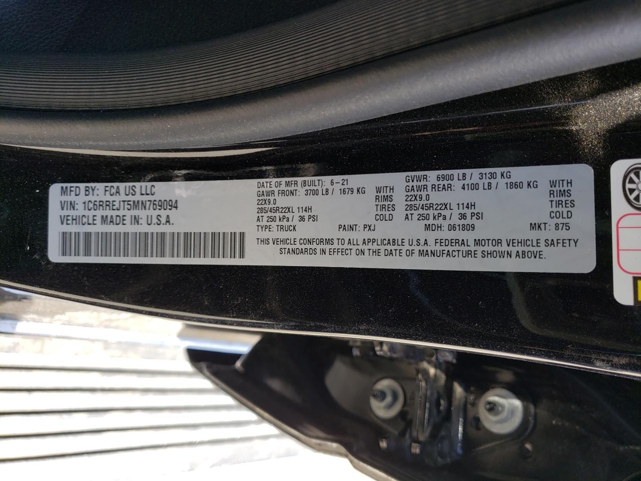 Photo 10 from auction – 2021 RAM 1500 LARAM with VIN 1C6RREJT5MN769094