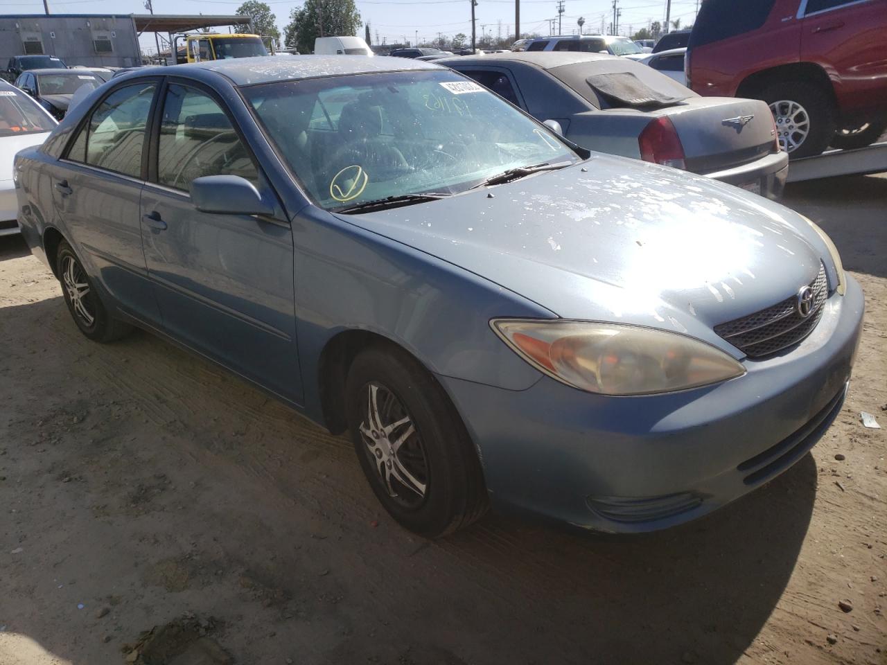 TOYOTA CAMRY LE 2003 with VIN 4T1BE30K13U717092 - Photo from auction