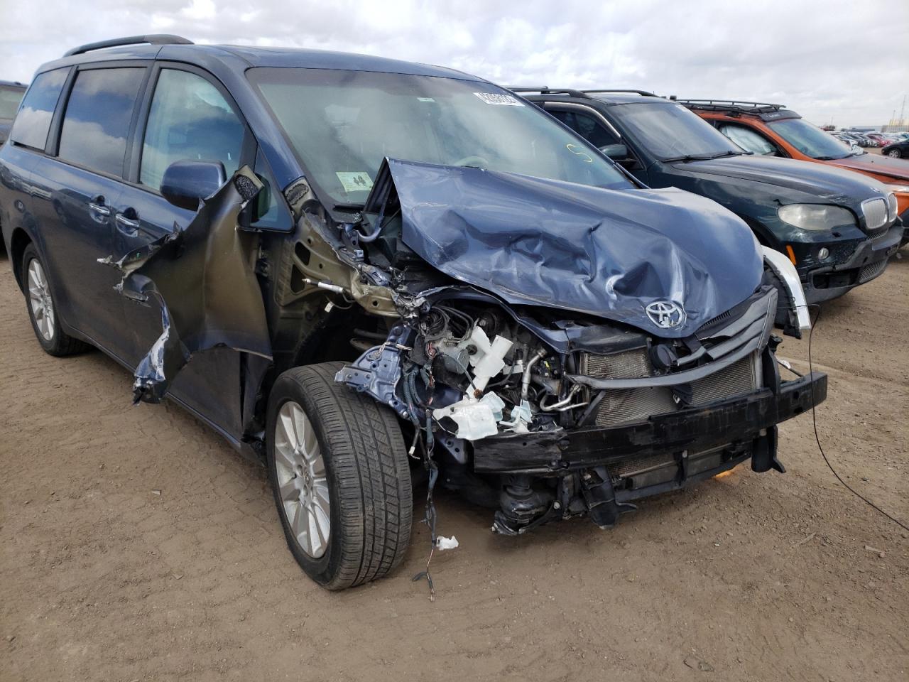 Photo 9 from auction – 2014 TOYOTA SIENNA XLE with VIN 5TDDK3DC6ES091166