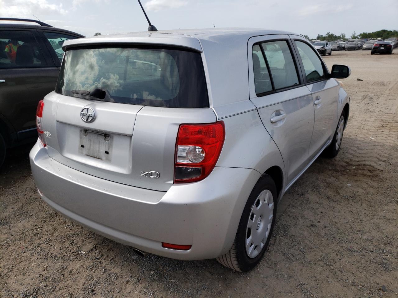 Photo 4 from auction – 2010 TOYOTA SCION XD with VIN JTKKU4B48A1002149