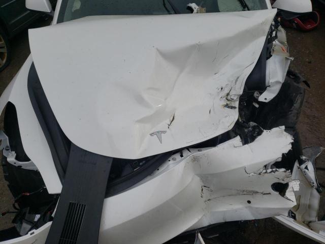 Photo 7 from auction – 2022 TESLA MODEL 3 with VIN 5YJ3E1EA8NF102743