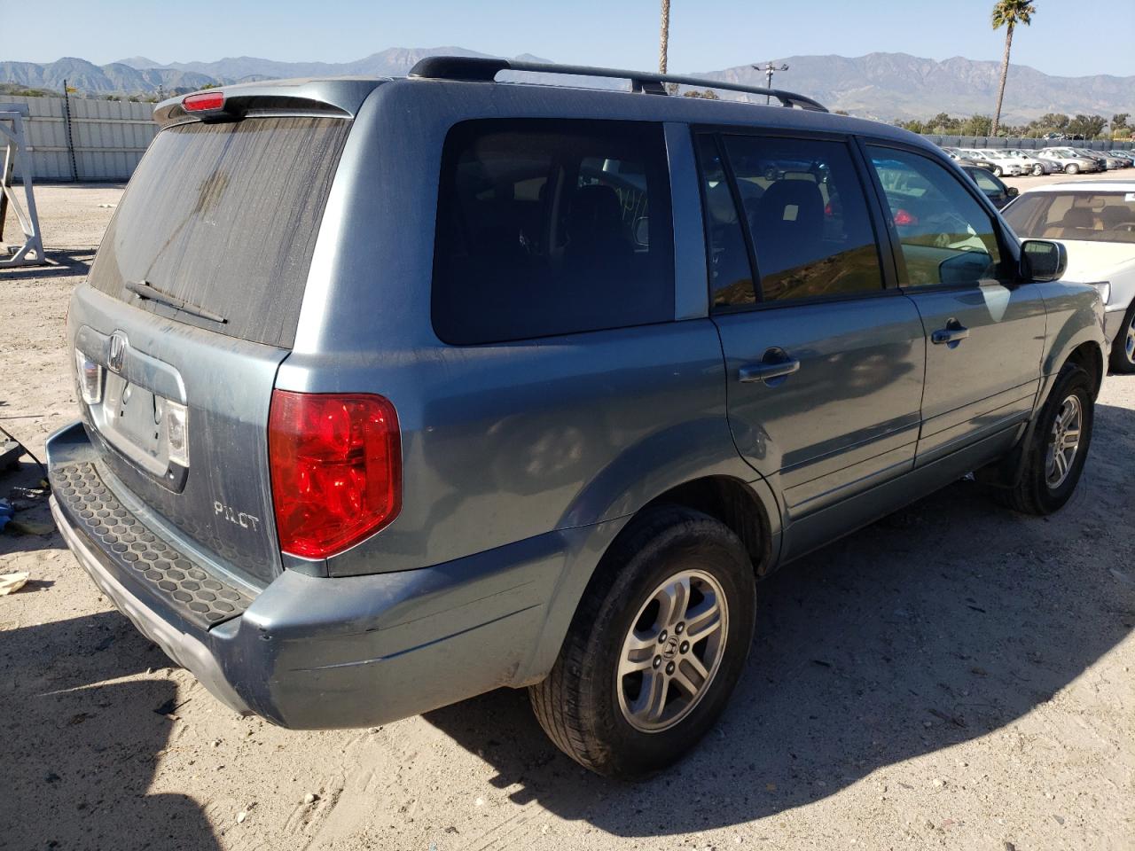 Photo 4 from auction – 2005 HONDA PILOT EX with VIN 2HKYF18405H533913