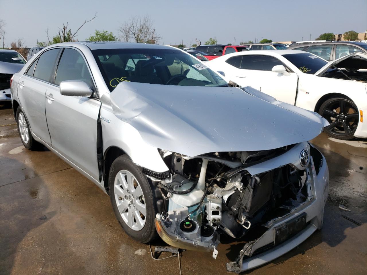 TOYOTA CAMRY HYBR 2007 with VIN JTNBB46K873009441 - Photo from auction