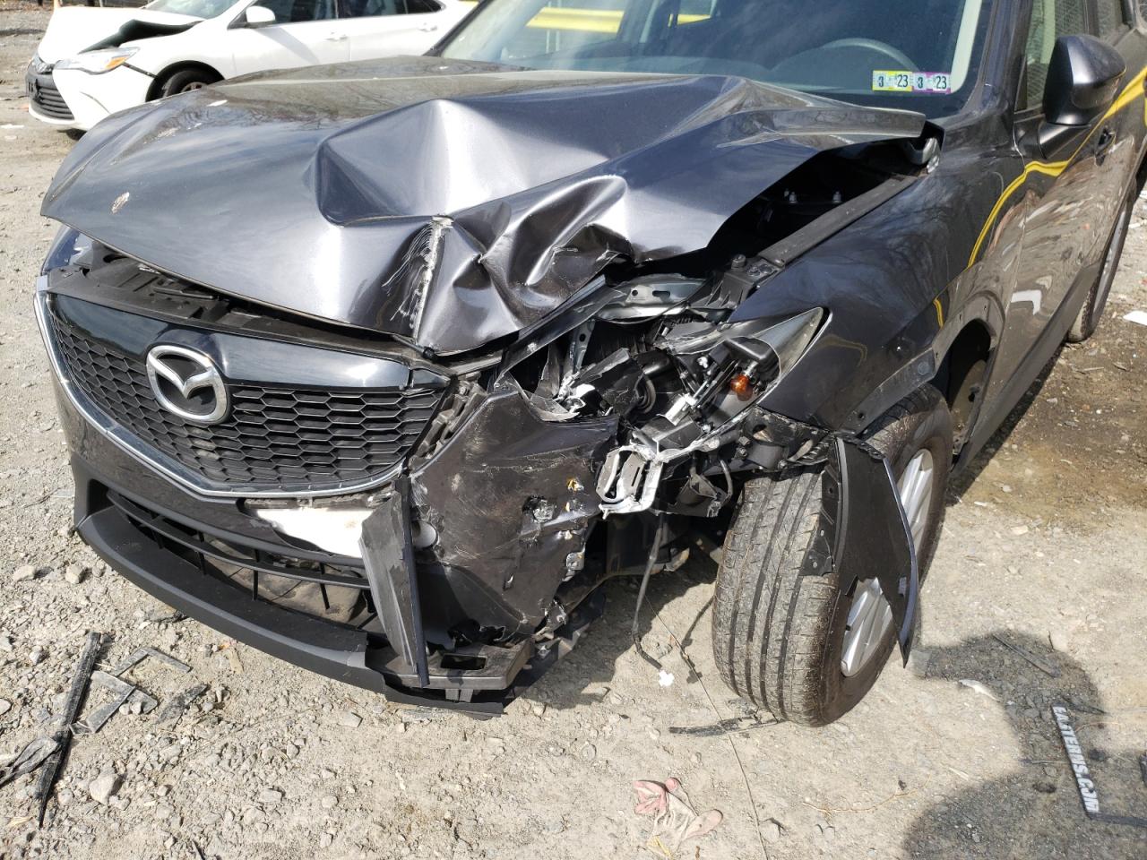 Photo 9 from auction – 2015 MAZDA CX-5 SPORT with VIN JM3KE2BE3F0446402