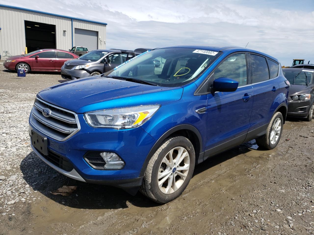 Photo 2 from auction – 2017 FORD ESCAPE SE with VIN 1FMCU9GD6HUC36649