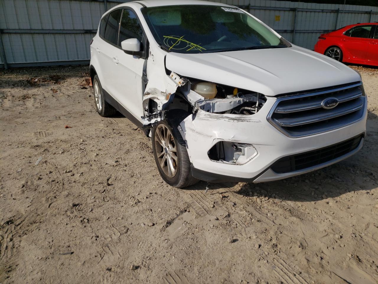 Photo 9 from auction – 2017 FORD ESCAPE SE with VIN 1FMCU9GD0HUC96359