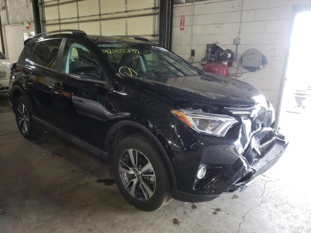 TOYOTA RAV4 XLE 2017 with VIN 2T3RFREV3HW610836 - Photo from auction