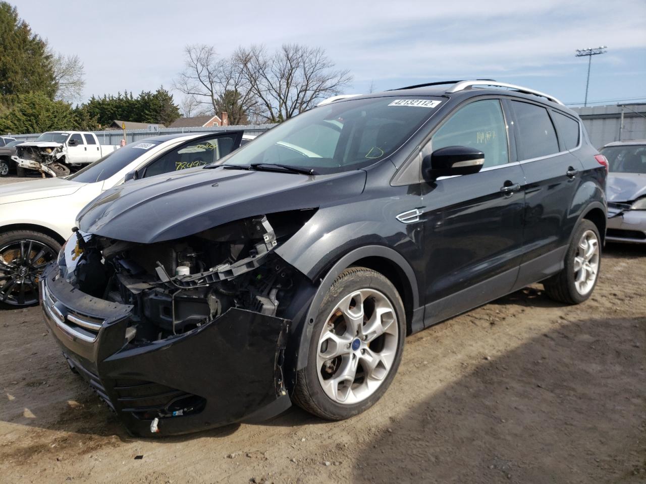 Photo 2 from auction – 2015 FORD ESCAPE TIT with VIN 1FMCU9J92FUC40604