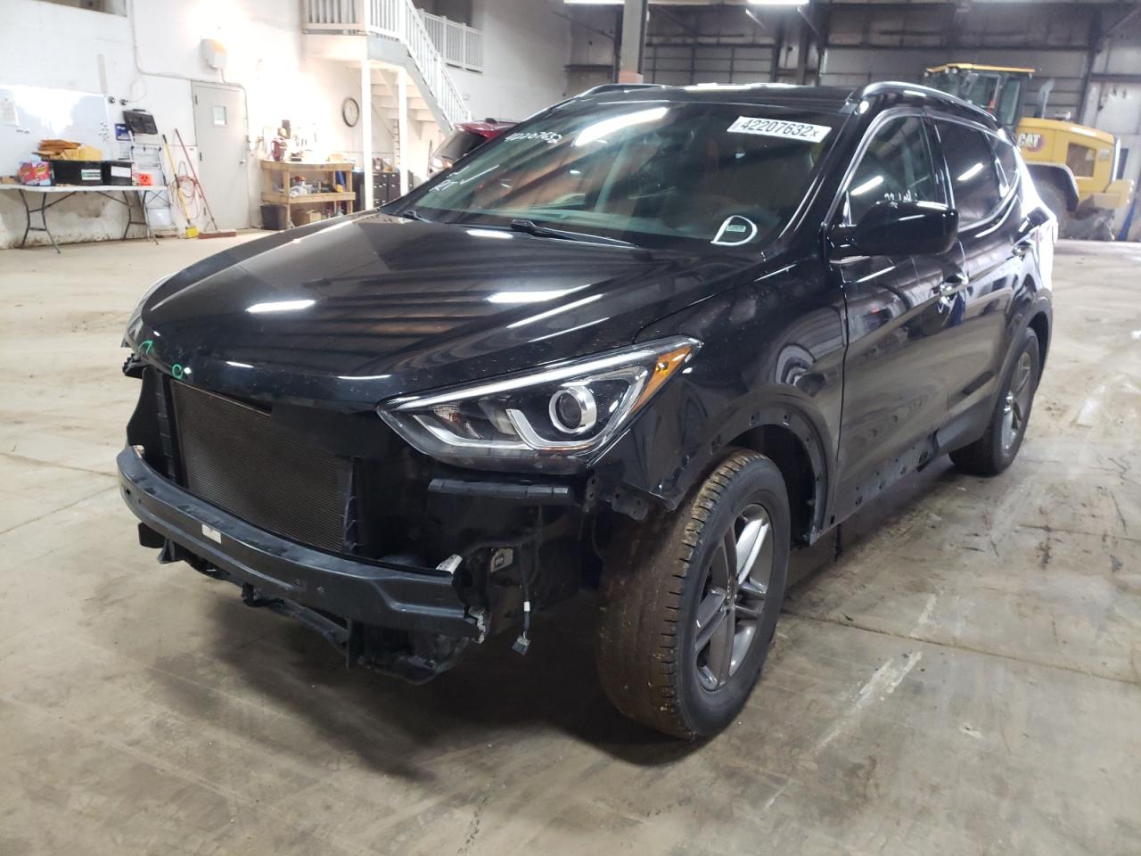 Photo 2 from auction – 2017 HYUNDAI SANTA FE S with VIN 5NMZU3LB2HH028629