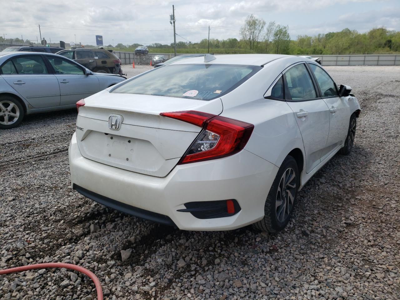 Photo 4 from auction – 2018 HONDA CIVIC EX with VIN 2HGFC2F77JH557858