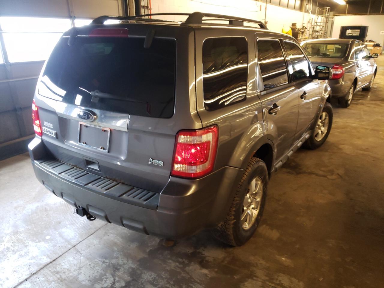 Photo 4 from auction – 2010 FORD ESCAPE LIM with VIN 1FMCU0EG9AKB75663