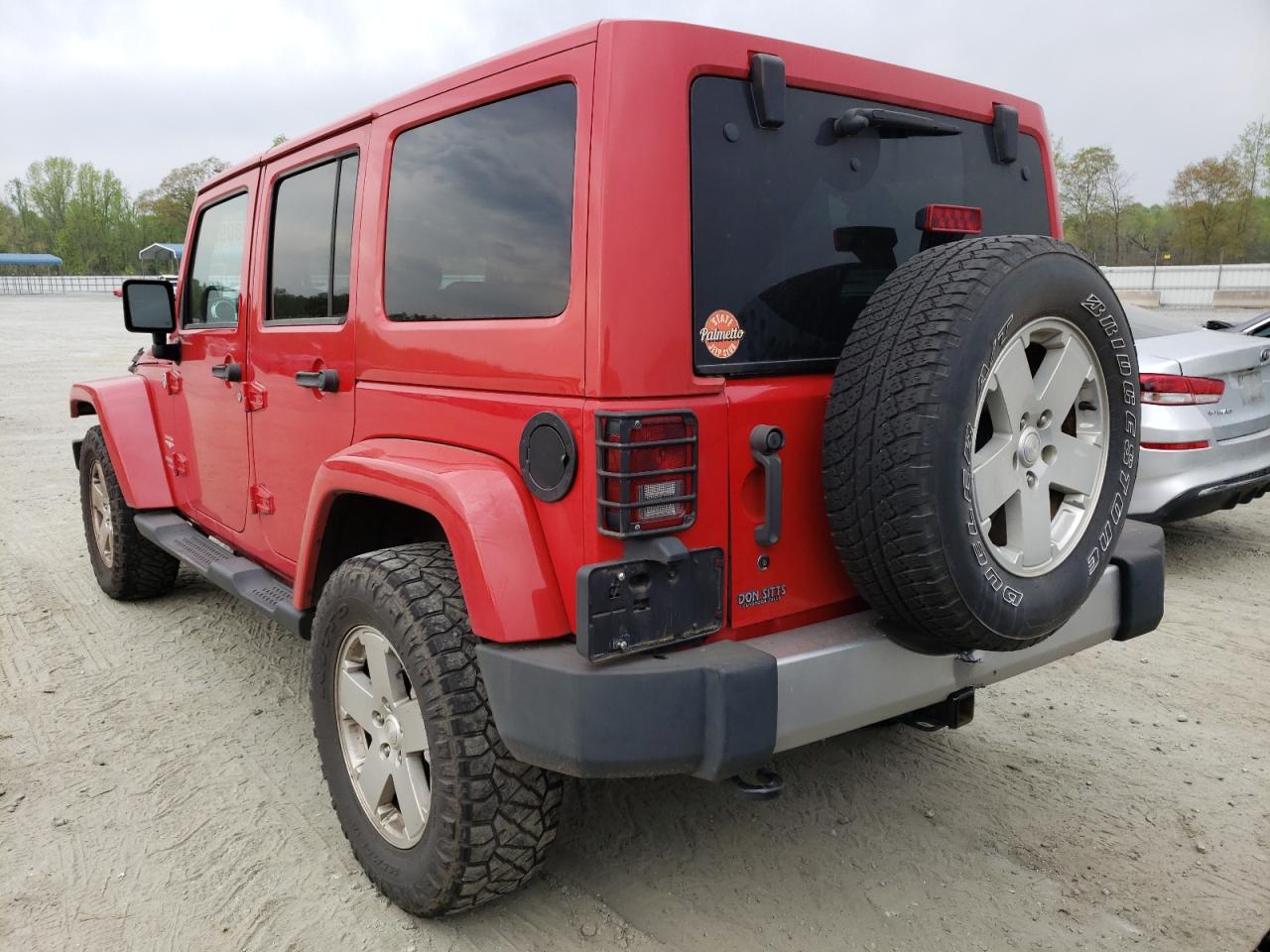 Photo 3 from auction – 2011 JEEP WRANGLER U with VIN 1J4BA5H15BL632441