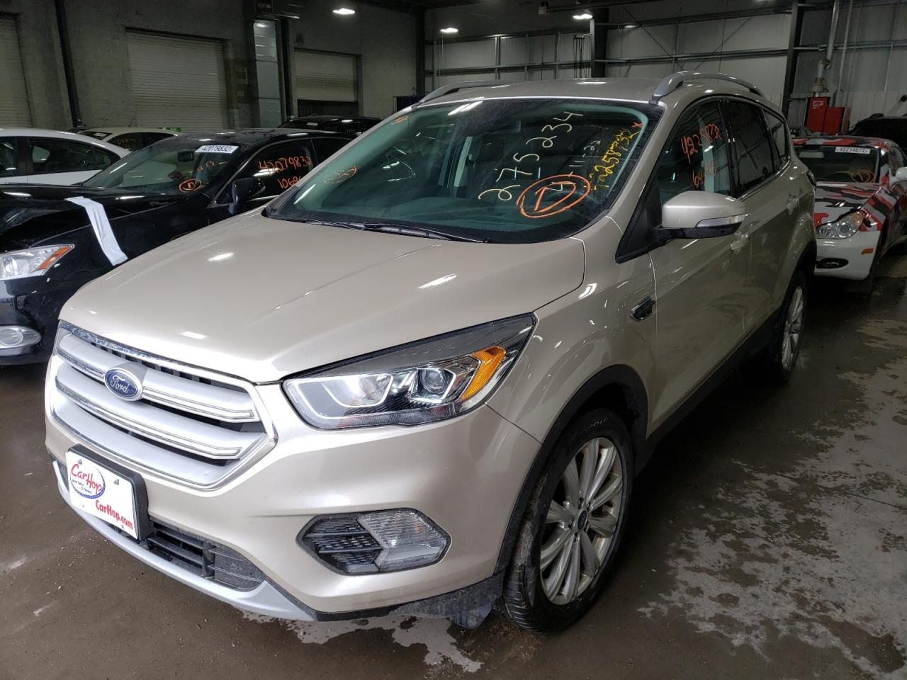 Photo 2 from auction – 2017 FORD ESCAPE TIT with VIN 1FMCU9J96HUD53930