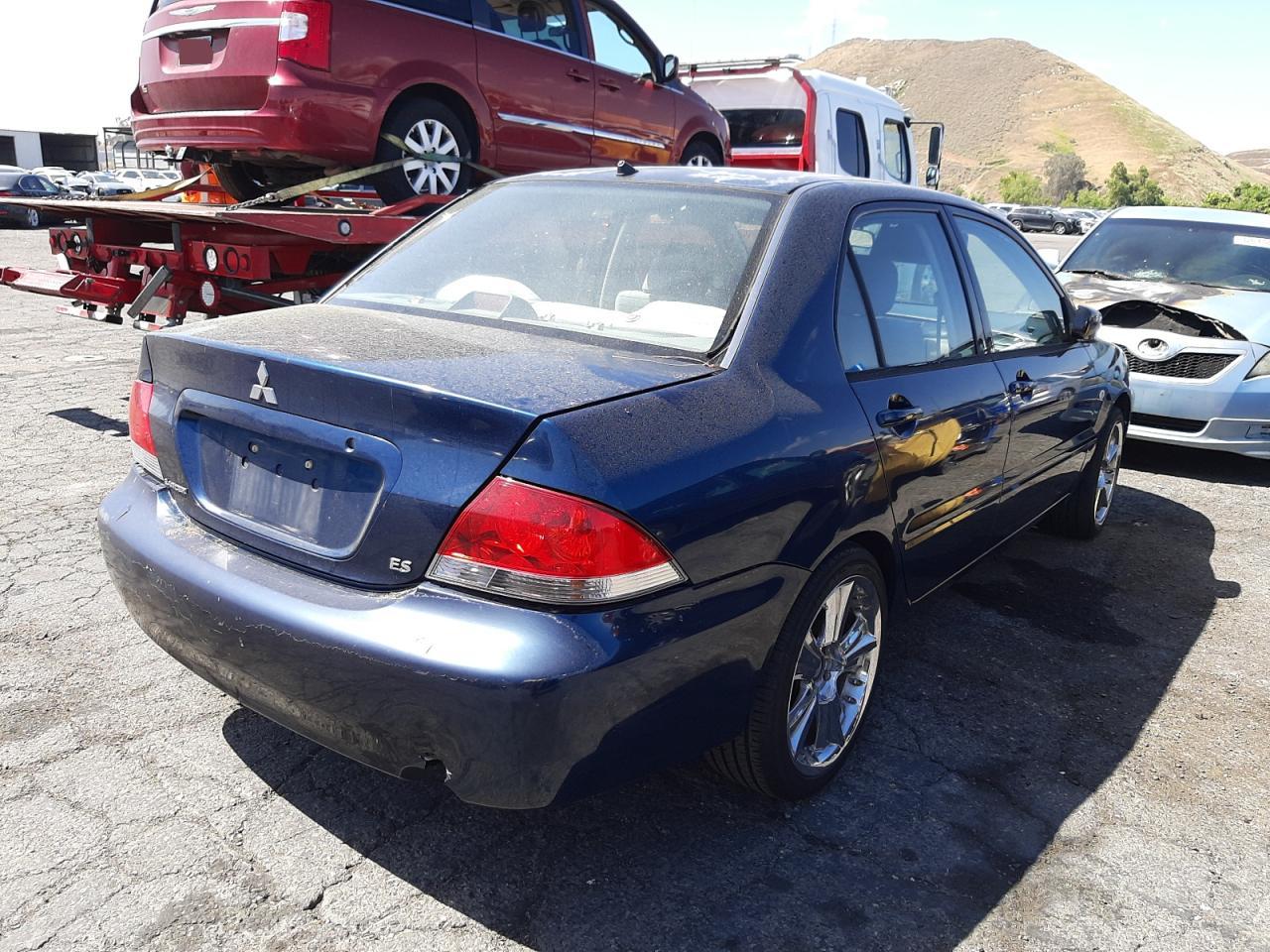 Photo 4 from auction – 2004 MITSUBISHI LANCER ES with VIN JA3AJ26E64U015518