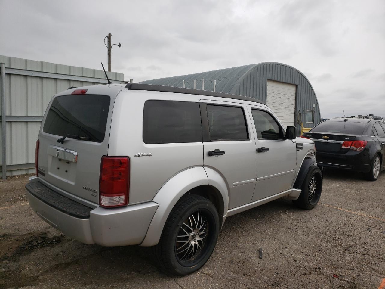 Photo 4 from auction – 2011 DODGE NITRO SXT with VIN 1D4PU5GK0BW574057