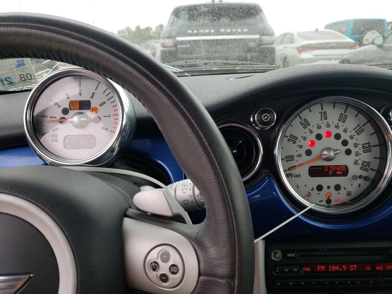 Photo 8 from auction – 2006 MINI COOPER S with VIN WMWRE33586TJ40545