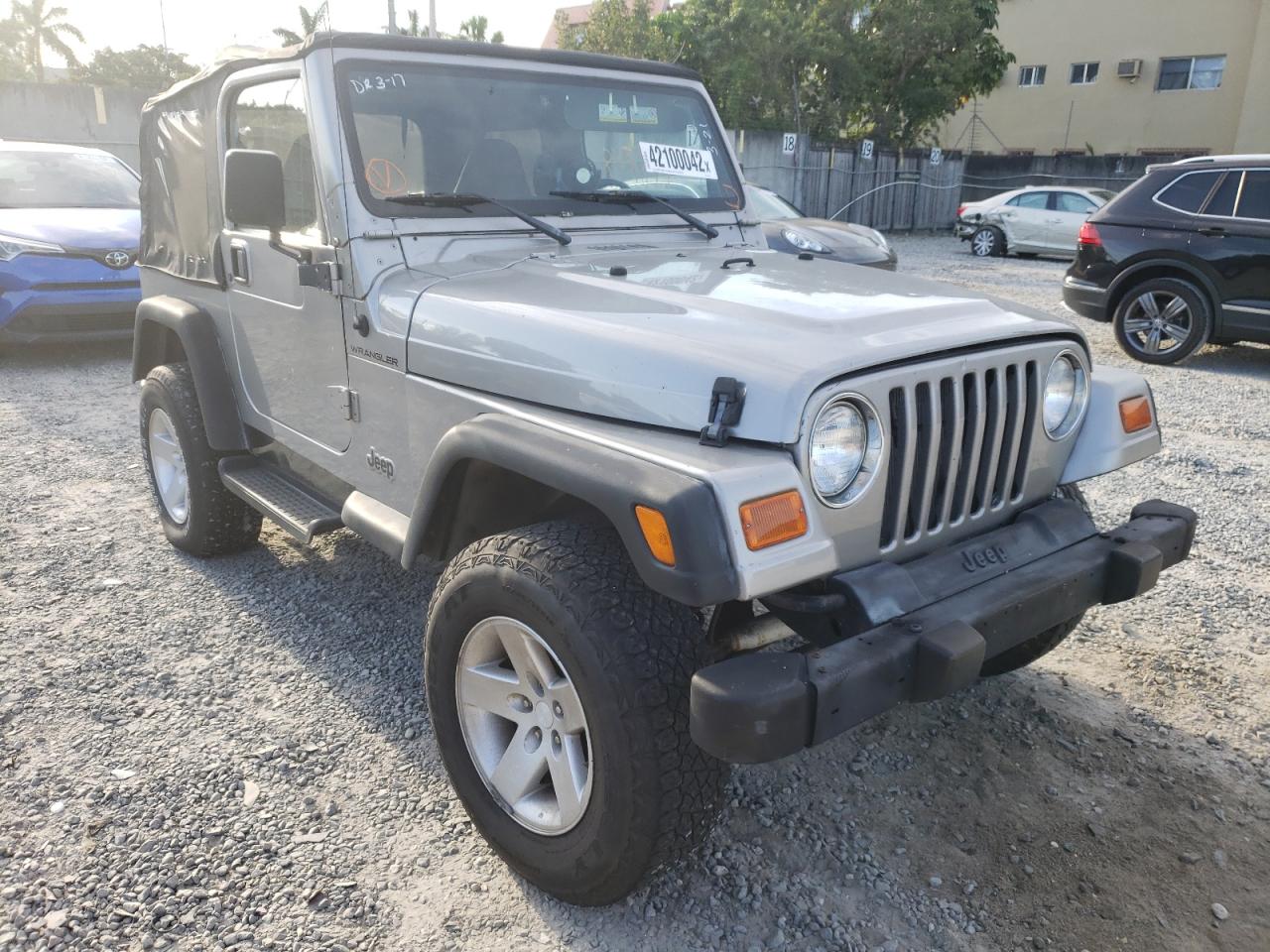JEEP WRANGLER / 2000 with VIN 1J4FA29P8YP718217 - Photo from auction