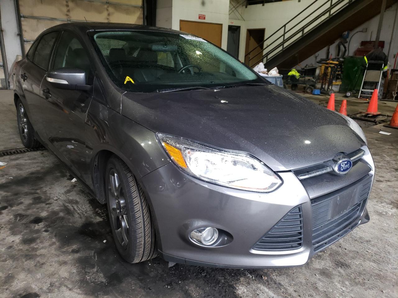 FORD FOCUS SE 2014 with VIN 1FADP3F24EL219708 - Photo from auction