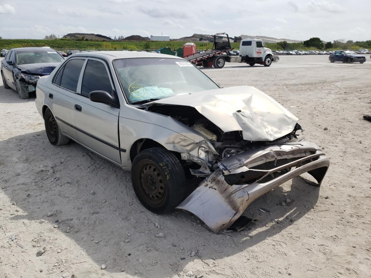 TOYOTA COROLLA VE 2000 with VIN 2T1BR12E8YC299199 - Photo from auction