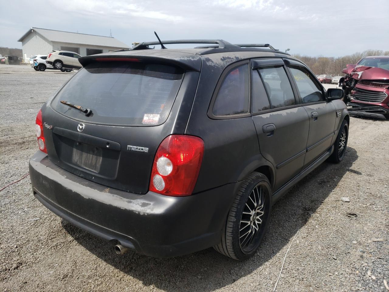 Photo 4 from auction – 2002 MAZDA PROTEGE PR with VIN JM1BJ245121478450