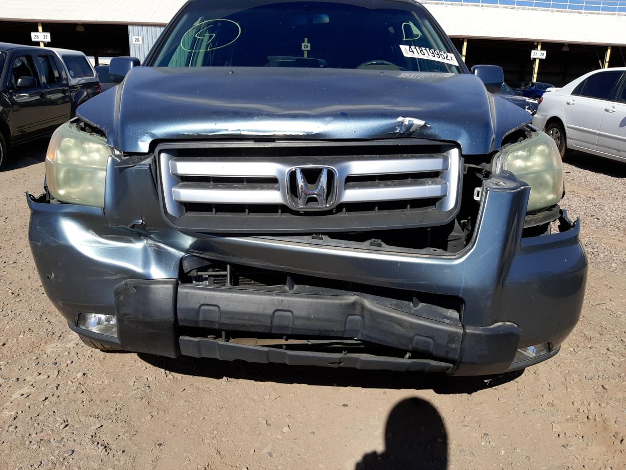 Photo 9 from auction – 2006 HONDA PILOT EX with VIN 2HKYF18706H513401