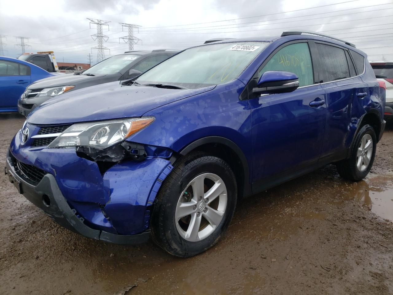 Photo 2 from auction – 2014 TOYOTA RAV4 XLE with VIN 2T3RFREV2EW226431