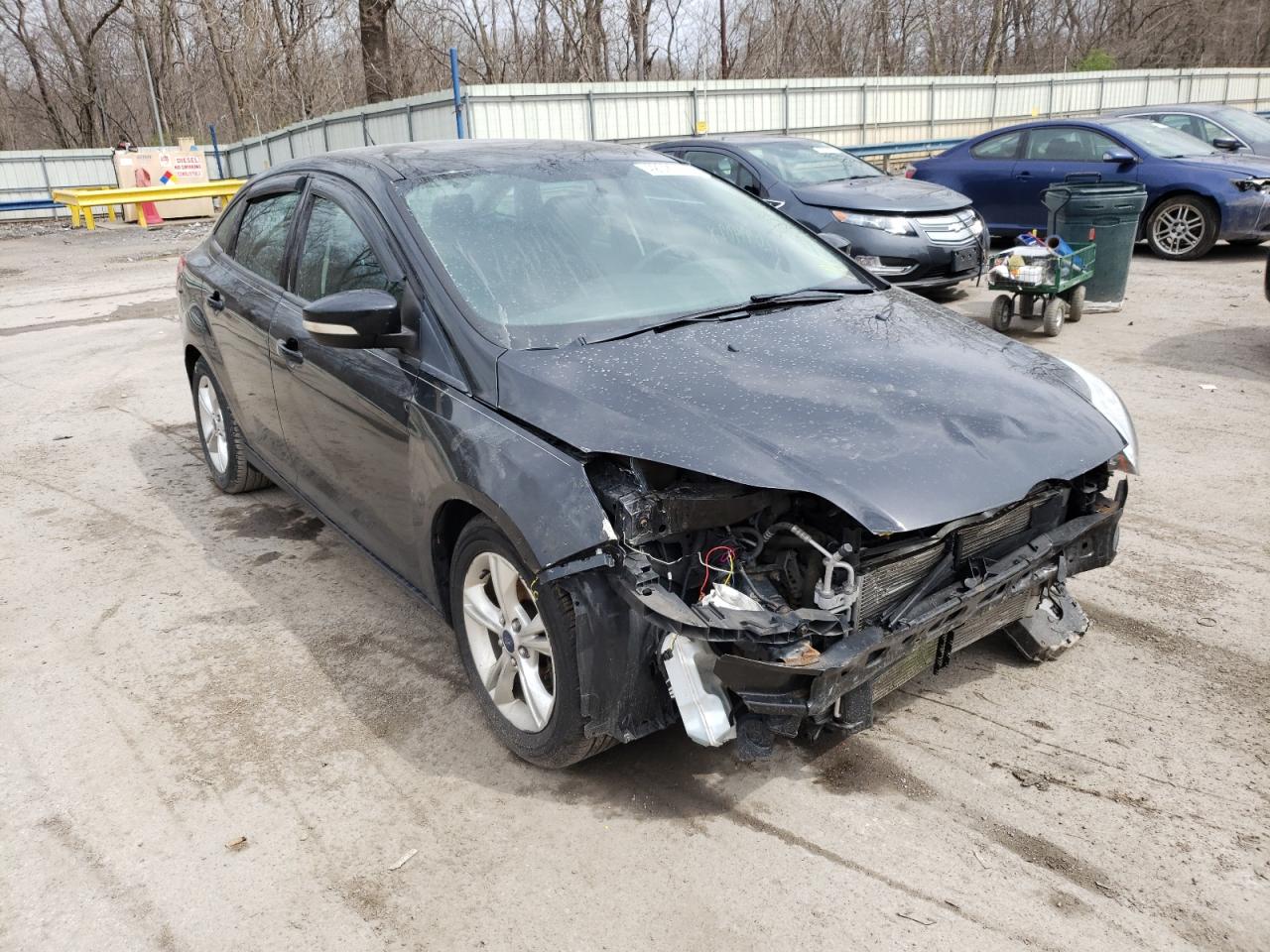 FORD FOCUS SE 2014 with VIN 1FADP3F24EL310378 - Photo from auction