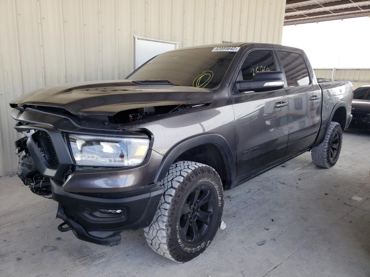 Photo 2 from auction – 2021 RAM 1500 REBEL with VIN 1C6SRFLT9MN583773