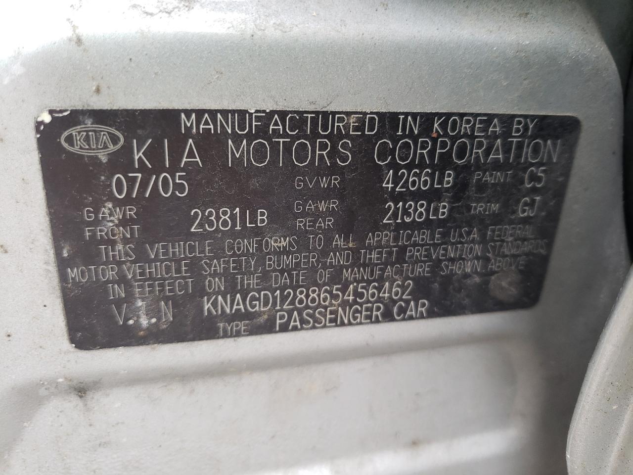 Photo 10 from auction – 2006 KIA OPTIMA LX with VIN KNAGD128865456462