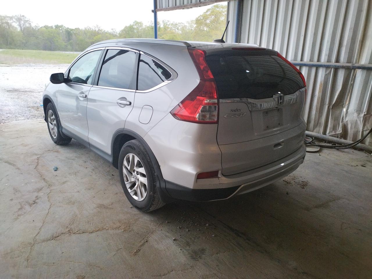 Photo 3 from auction – 2016 HONDA CR-V EXL with VIN 2HKRM3H72GH565099