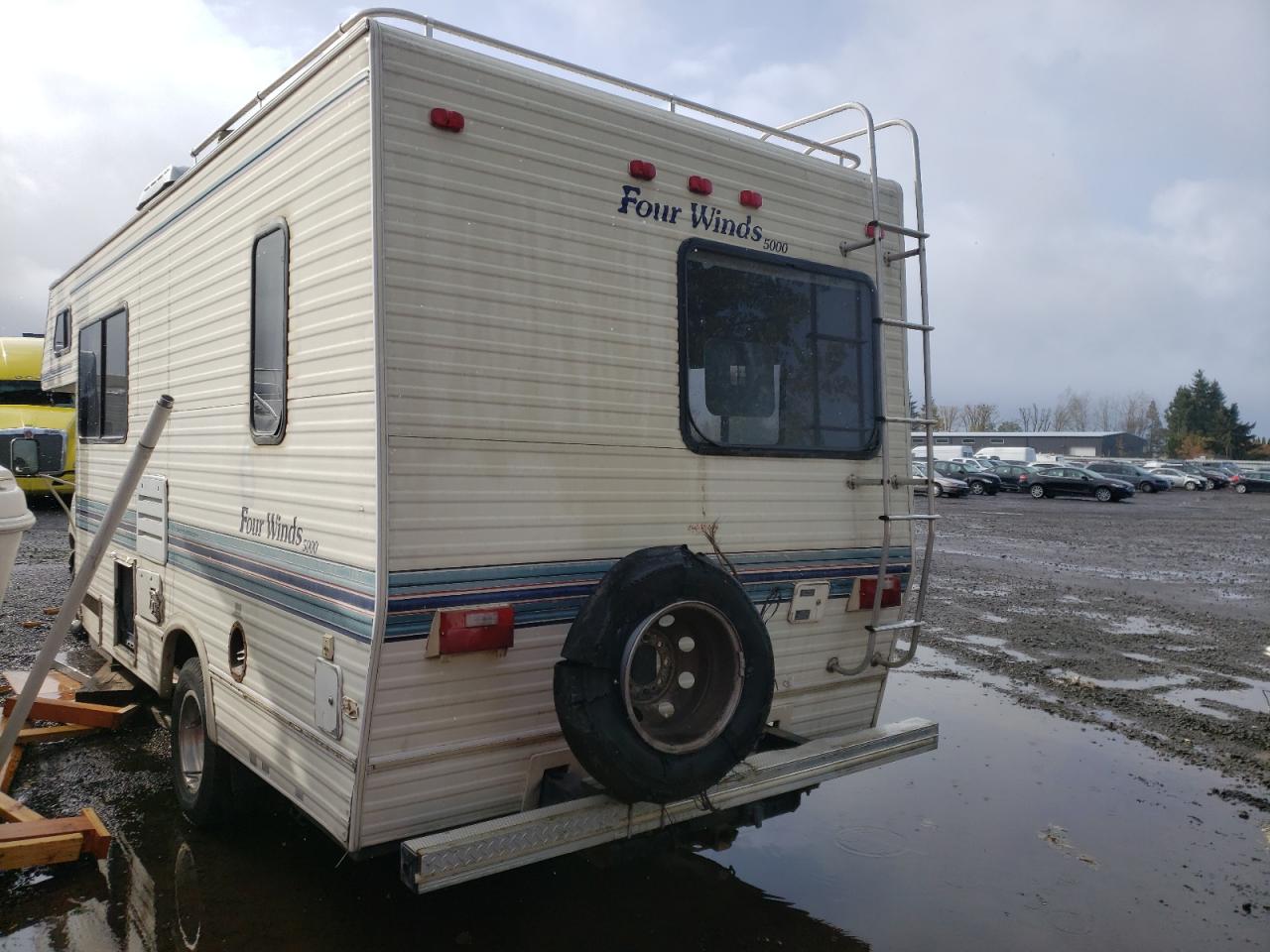 Photo 3 from auction – 1994 FORD FOURWINDS with VIN 1FDKE30G8PHB84023