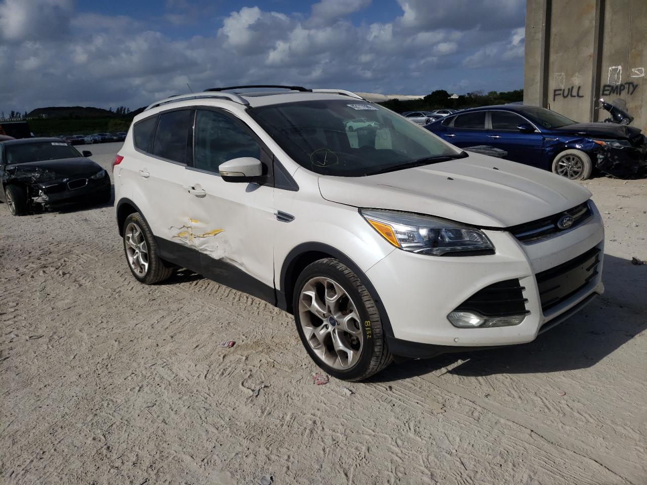 FORD ESCAPE TIT 2013 with VIN 1FMCU9J90DUA70577 - Photo from auction