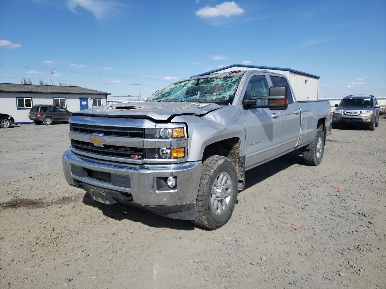 Photo 2 from auction – 2019 CHEVROLET SILVERADO with VIN 1GC4KWCY0KF244926