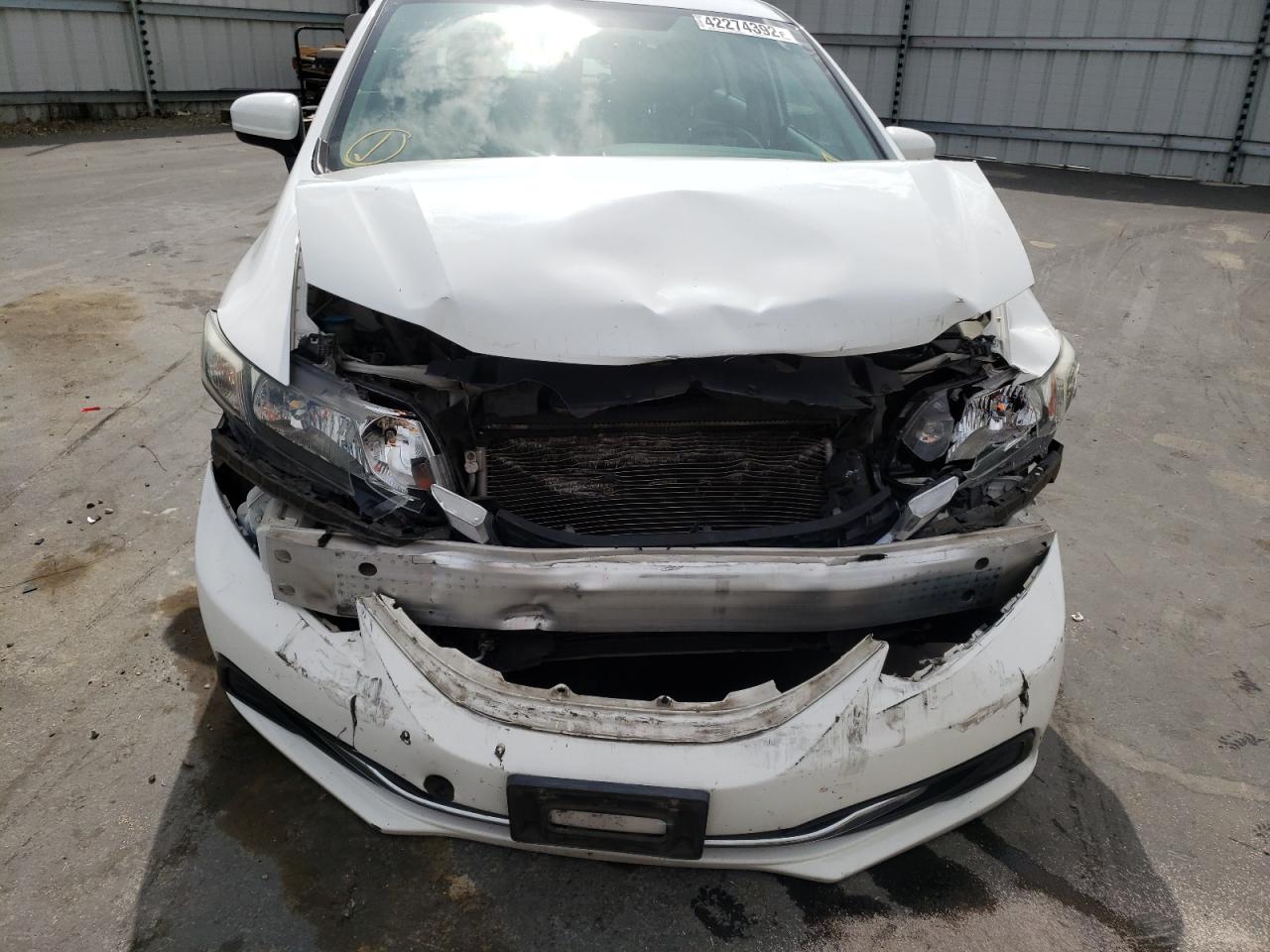 Photo 9 from auction – 2014 HONDA CIVIC LX with VIN 19XFB2F5XEE083664