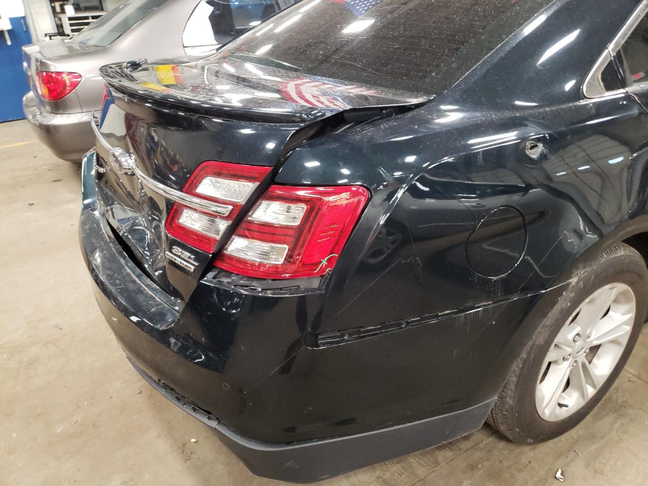 Photo 9 from auction – 2014 FORD TAURUS SEL with VIN 1FAHP2E81EG184569