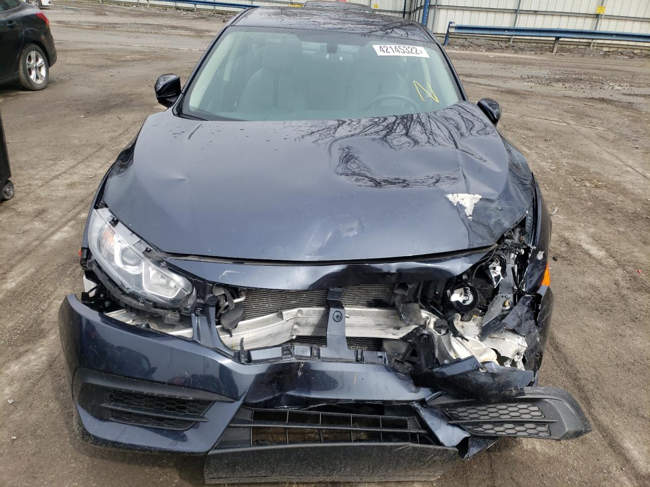 Photo 7 from auction – 2017 HONDA CIVIC LX with VIN 2HGFC2F53HH536577
