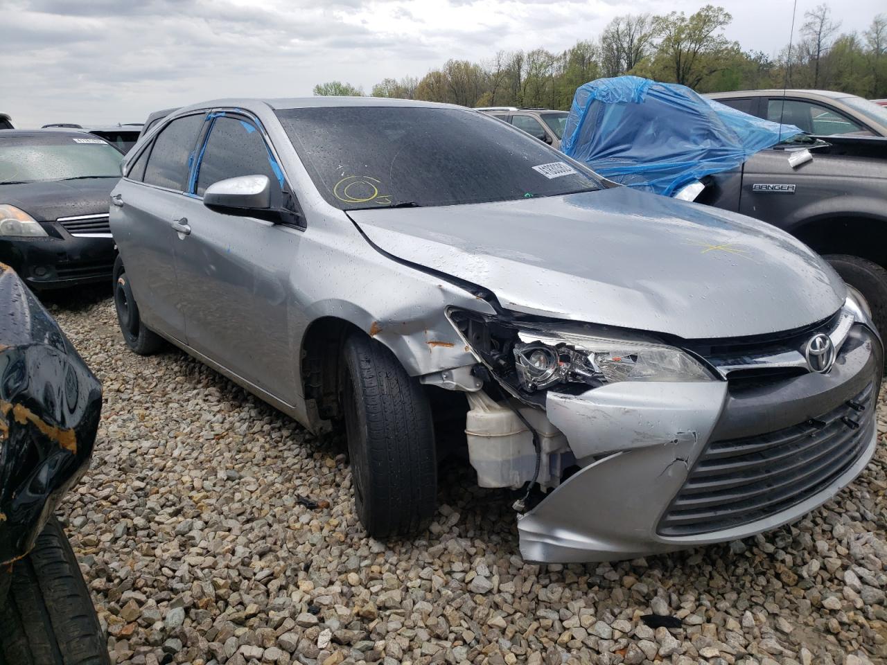 TOYOTA CAMRY LE 2016 with VIN 4T1BF1FKXGU571693 - Photo from auction
