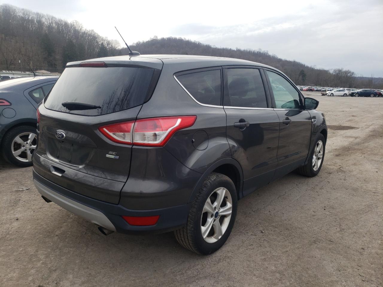 Photo 4 from auction – 2015 FORD ESCAPE SE with VIN 1FMCU9GX7FUA75865