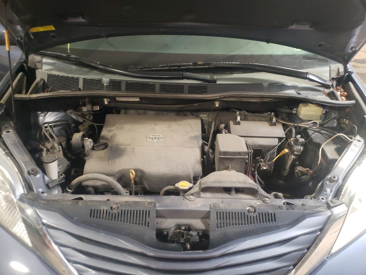 Photo 7 from auction – 2015 TOYOTA SIENNA LE with VIN 5TDKK3DC7FS618222