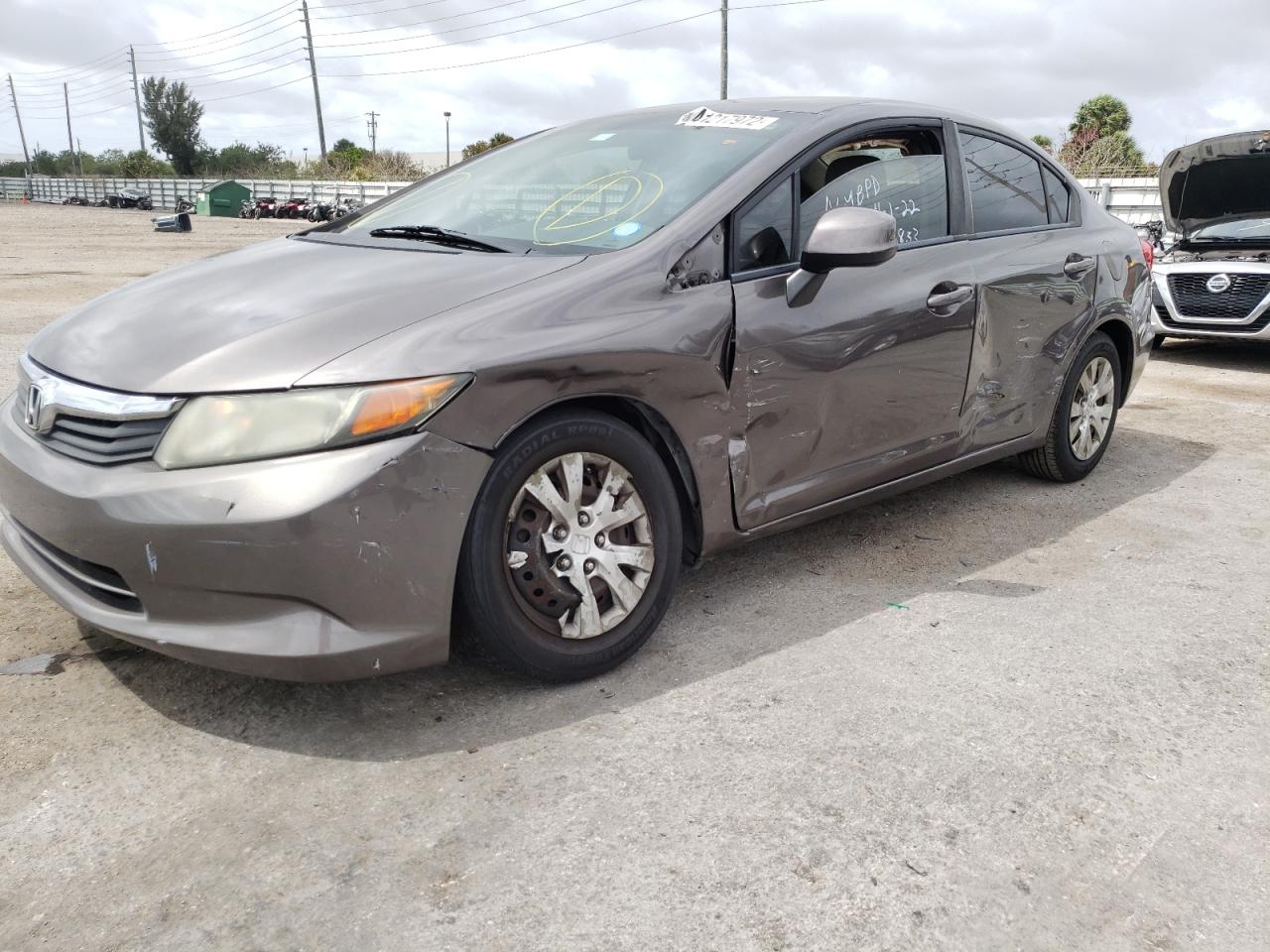 Photo 9 from auction – 2012 HONDA CIVIC LX with VIN 19XFB2F57CE036833