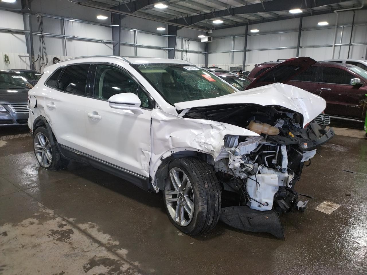 LINCOLN MKC 2015 with VIN 5LMTJ2AH5FUJ14113 - Photo from auction