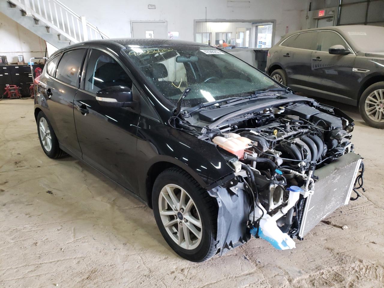 FORD FOCUS 2015 with VIN 1FADP3K27FL375118 - Photo from auction