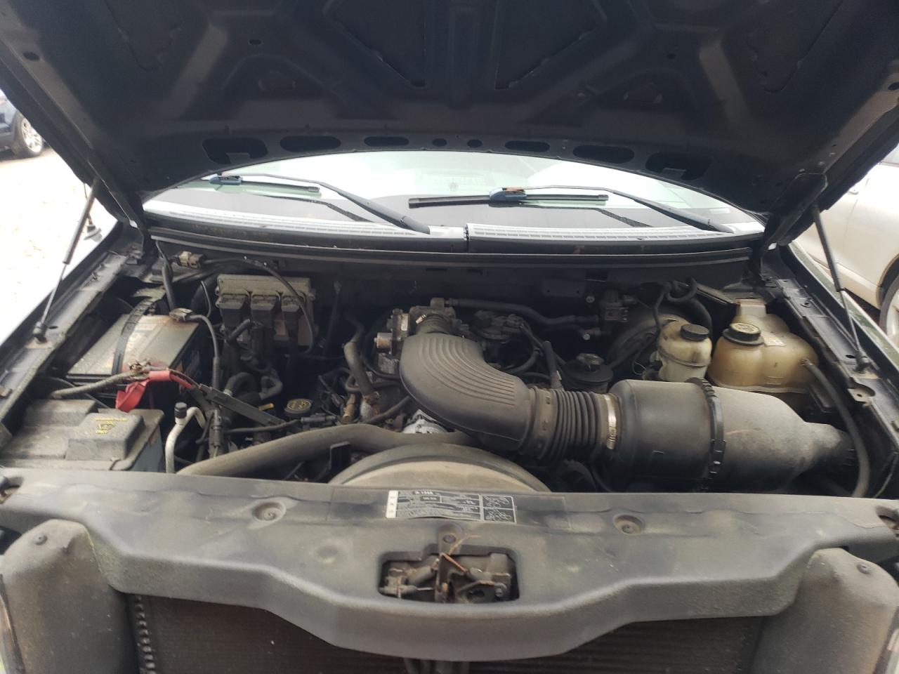 Photo 7 from auction – 2005 FORD F150 with VIN 1FTRX14W15FA58324