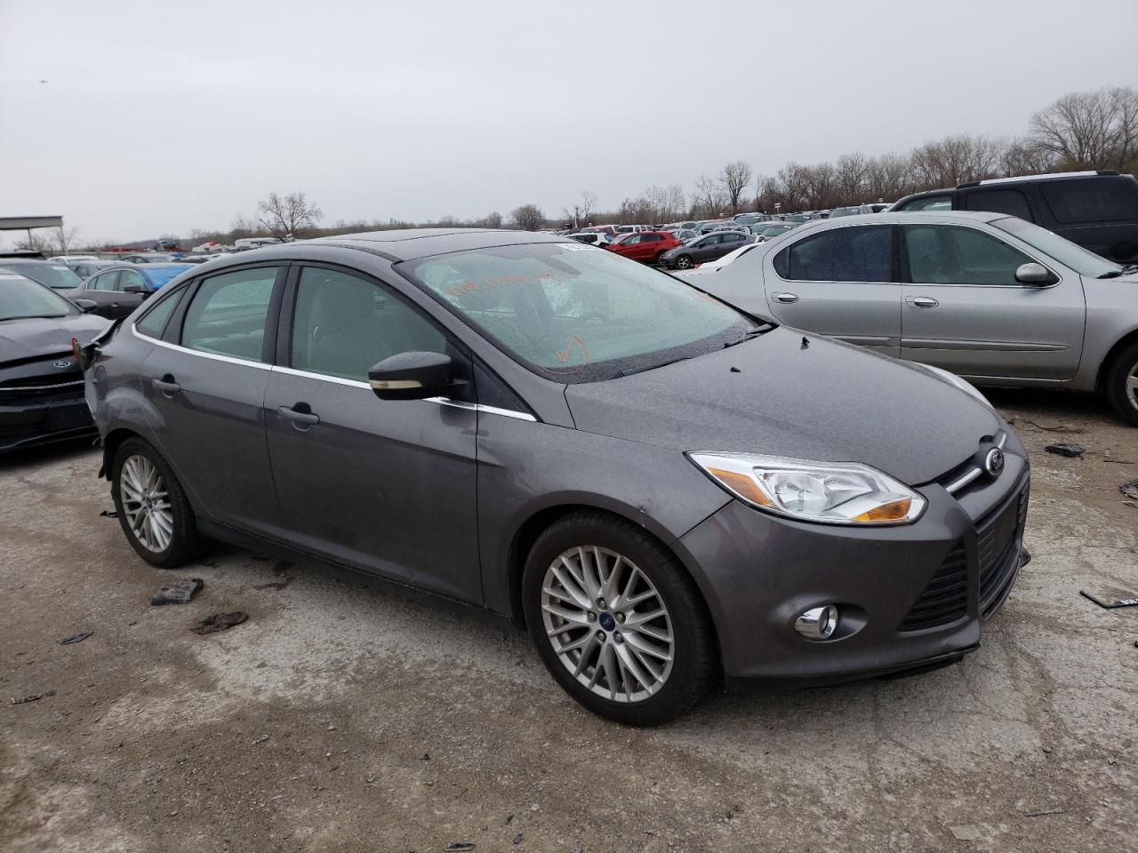 FORD FOCUS SEL 2012 with VIN 1FAHP3H27CL179975 - Photo from auction
