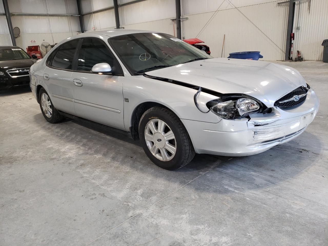 FORD TAURUS SEL 2003 with VIN 1FAHP56S23A106734 - Photo from auction