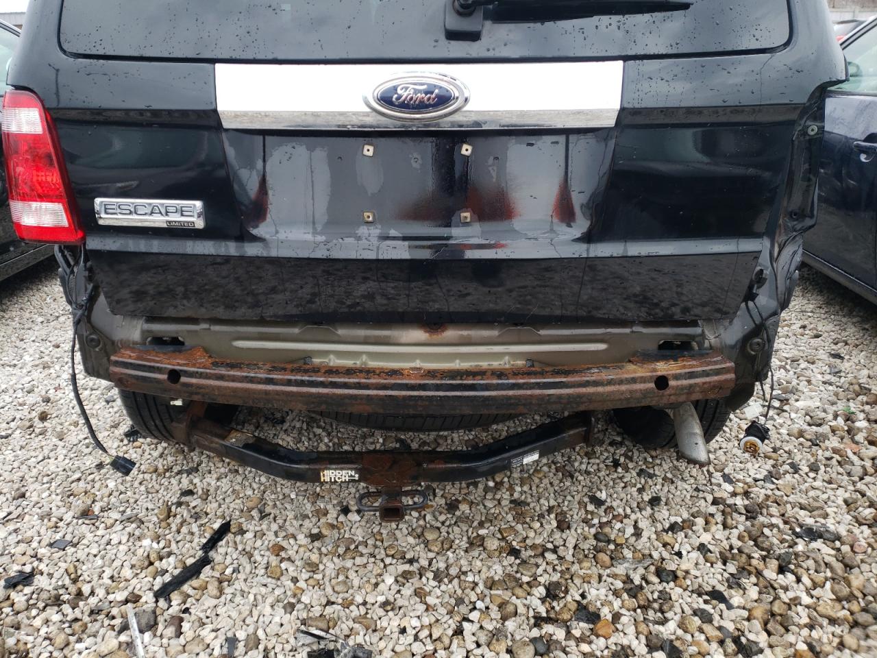 Photo 9 from auction – 2009 FORD ESCAPE LIM with VIN 1FMCU04709KD08842
