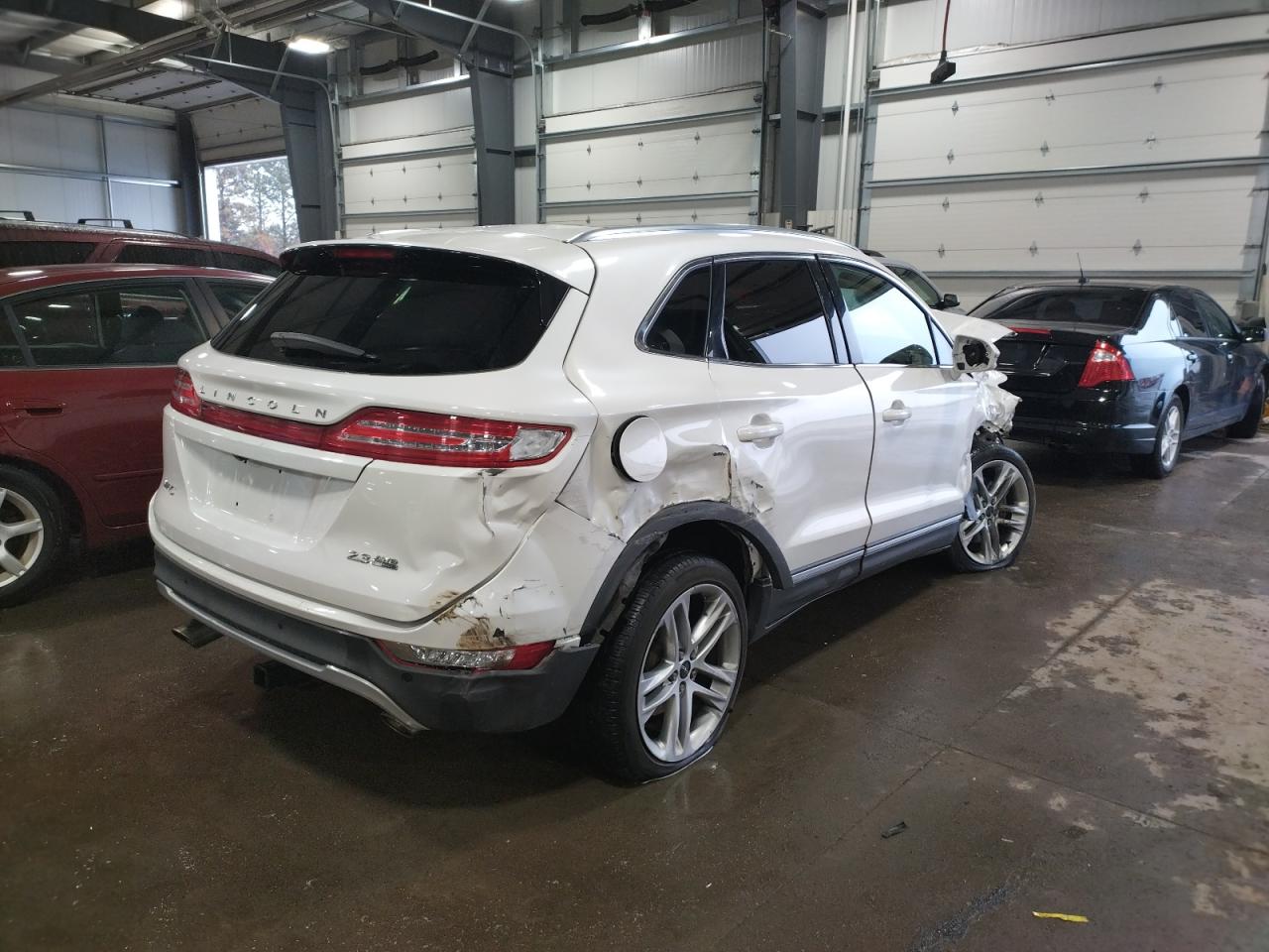 Photo 4 from auction – 2015 LINCOLN MKC with VIN 5LMTJ2AH5FUJ14113