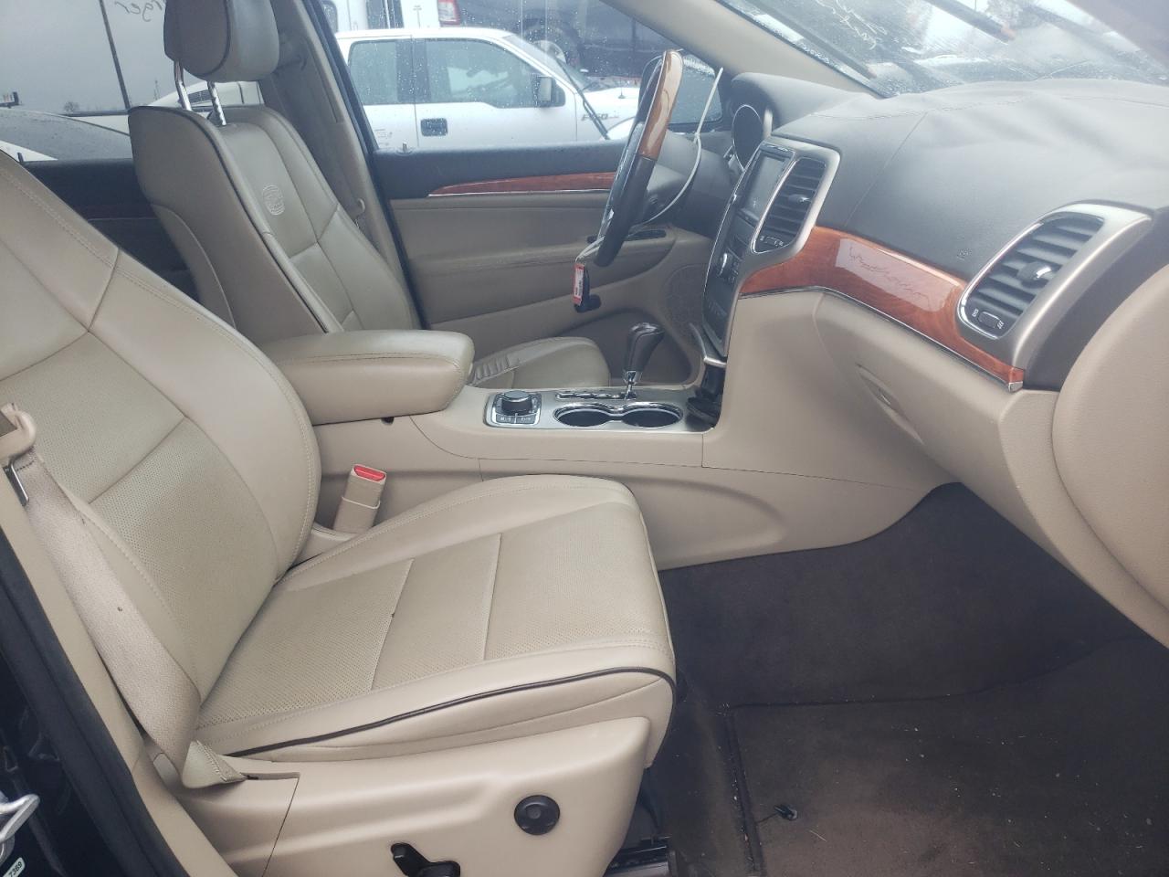 Photo 5 from auction – 2011 JEEP GRAND CHER with VIN 1J4RR6GT9BC536134